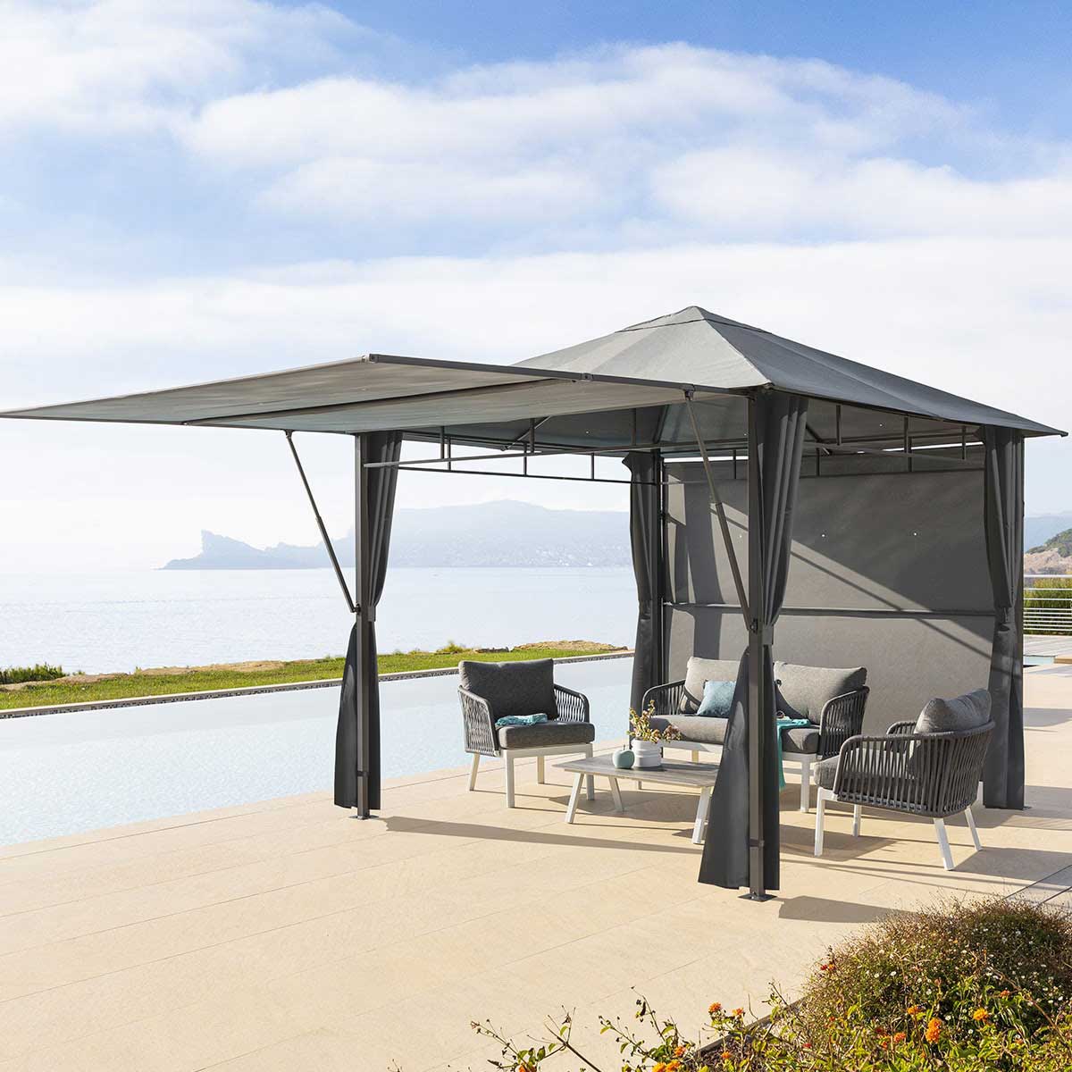 P&eacute;rgola OMELYA gris ard&oacute;sia con cortinas 3x3m