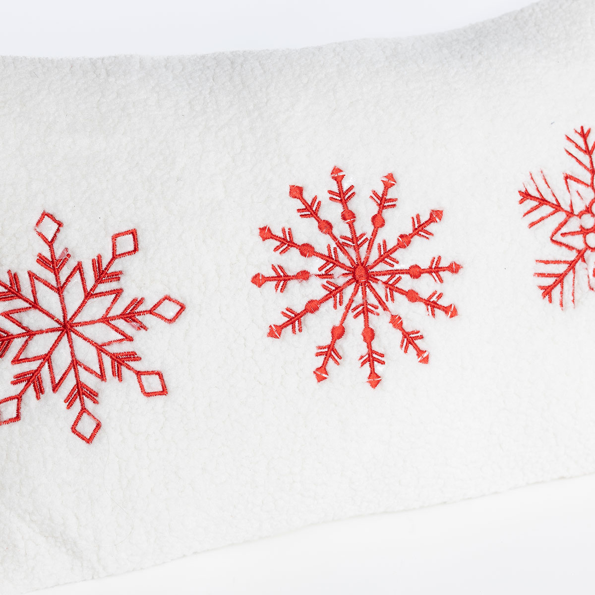 Almohada copos de nieve sherpa 30x50cm